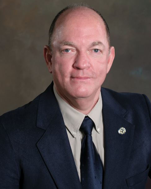 Portrait of Dr. Andy Sykes