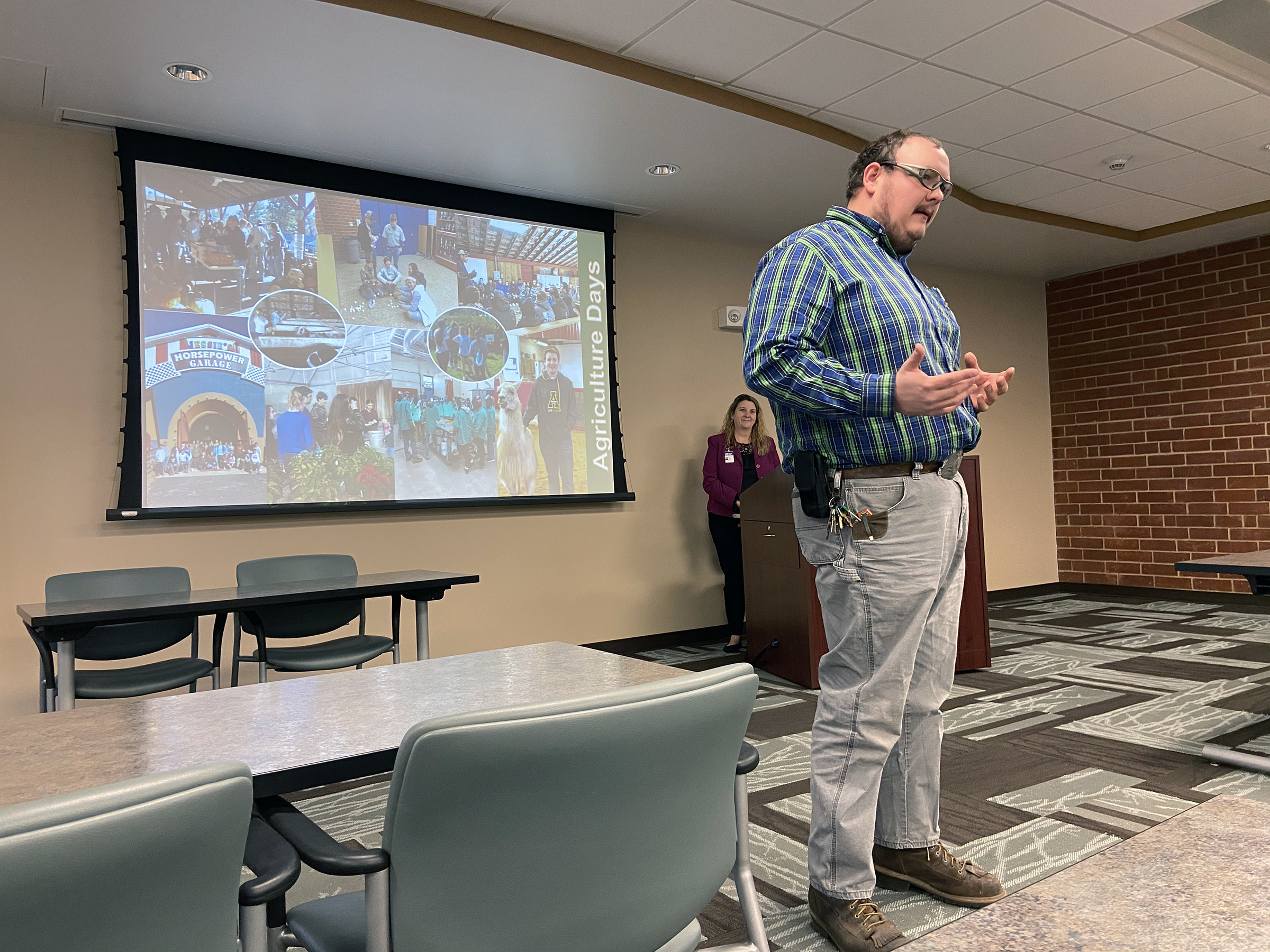 Alt textSouthwestern Randolph High School teacher and Randolph Community College Agricultural Mechanics Instructor Andrew Atwell discusses Agriculture Day on Tuesday, Dec. 3, during an Agriculture Summit in the JB & Claire Davis Corporate Training Center on the Asheboro Campus.