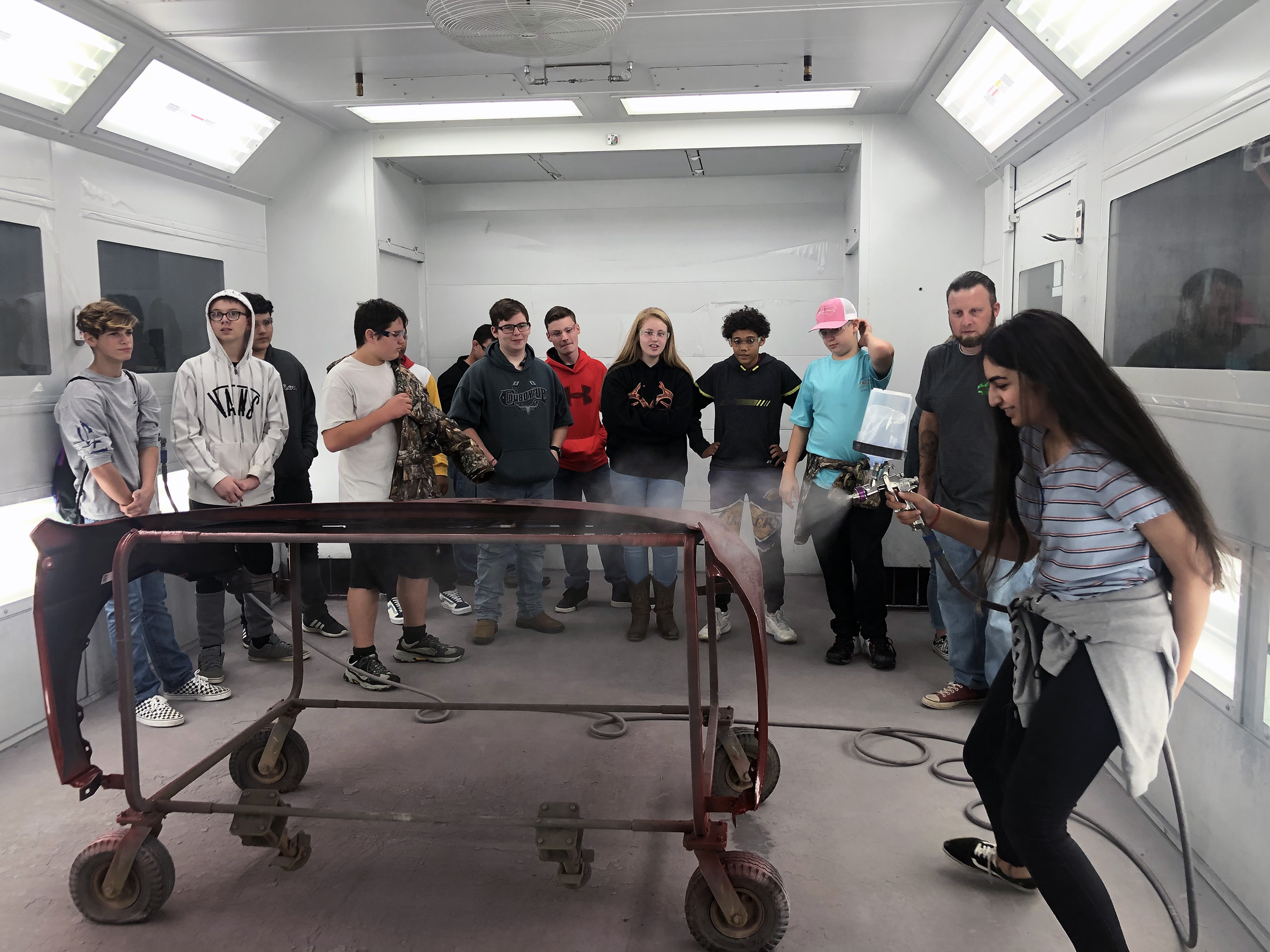 Local middle school students participate in a paint activity as part of Automotive Day on Friday, Nov. 8, in the Richard Petty Education Center at Randolph Community College.Local middle school students participate in a paint activity as part of Automotive Day on Friday, Nov. 8, in the Richard Petty Education Center at Randolph Community College.