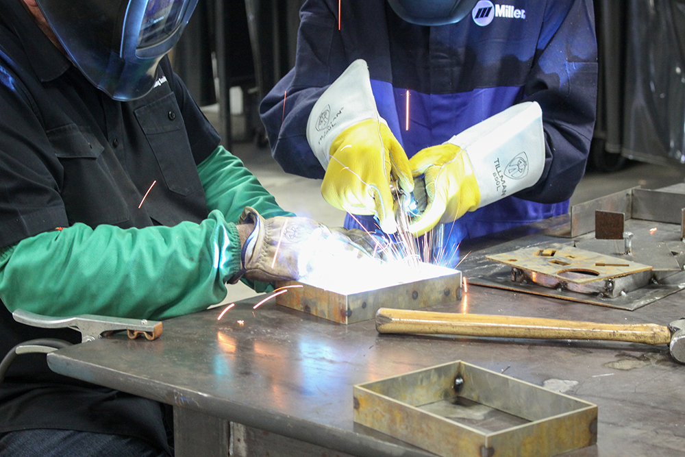 Randolph Community College, Asheboro City Schools, and the Randolph County School System partnered to bring together three Pathways Camps — AMP Camp, HIP Camp, and APP Camp — at the end of June. Students and teachers participating in the AMP Camp were treated to a welding exercise (above).