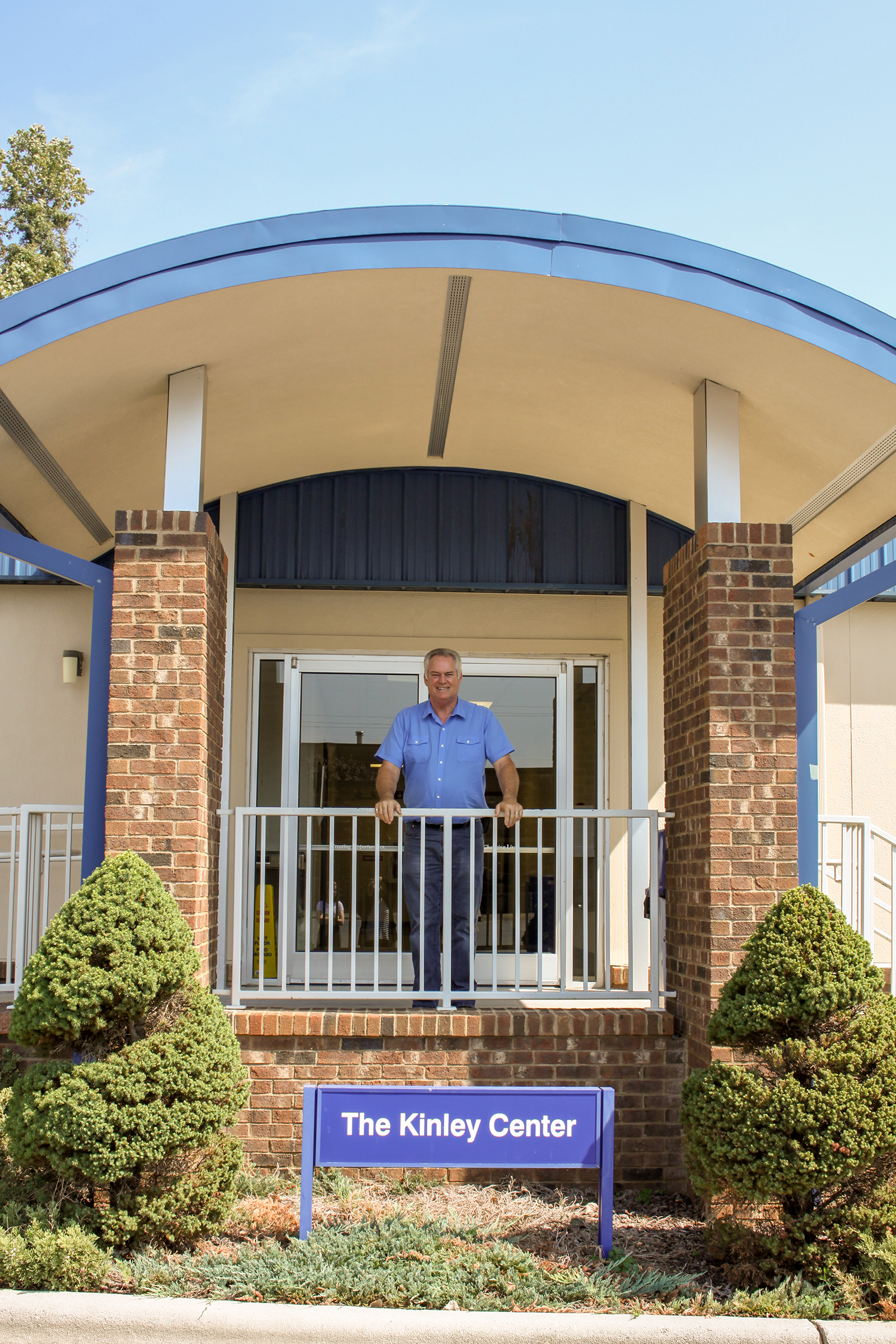Ken Kinley stands in front of the newly-named Kinley Center on Randolph Community College’s Asheboro Campus. Kinley, RCC’s Assistant Director of Facilities, retired on Sept. 30 after working 40 years at the College — the longest tenure of any employee.