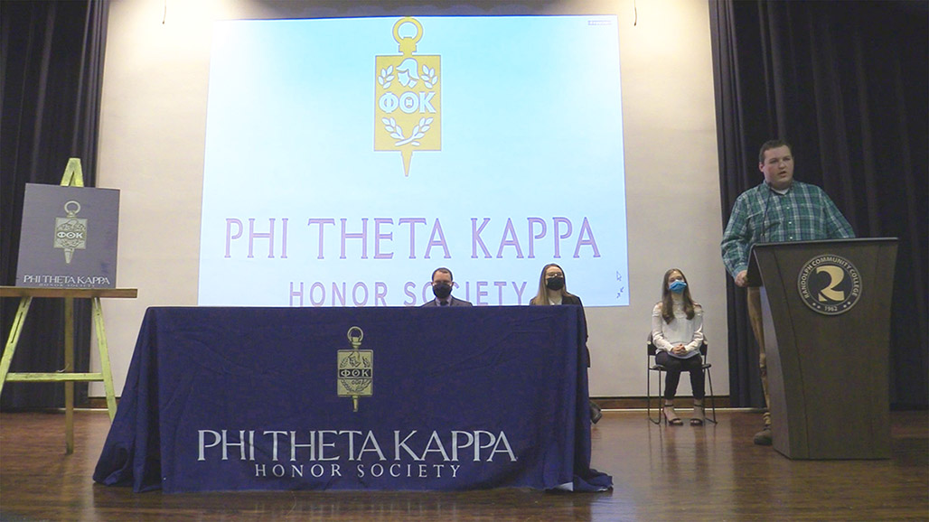 Randolph Community College Phi Theta Kappa (PTK) President Grayson Greenwood explains the purpose of PTK during the virtual induction ceremony Dec. 8.