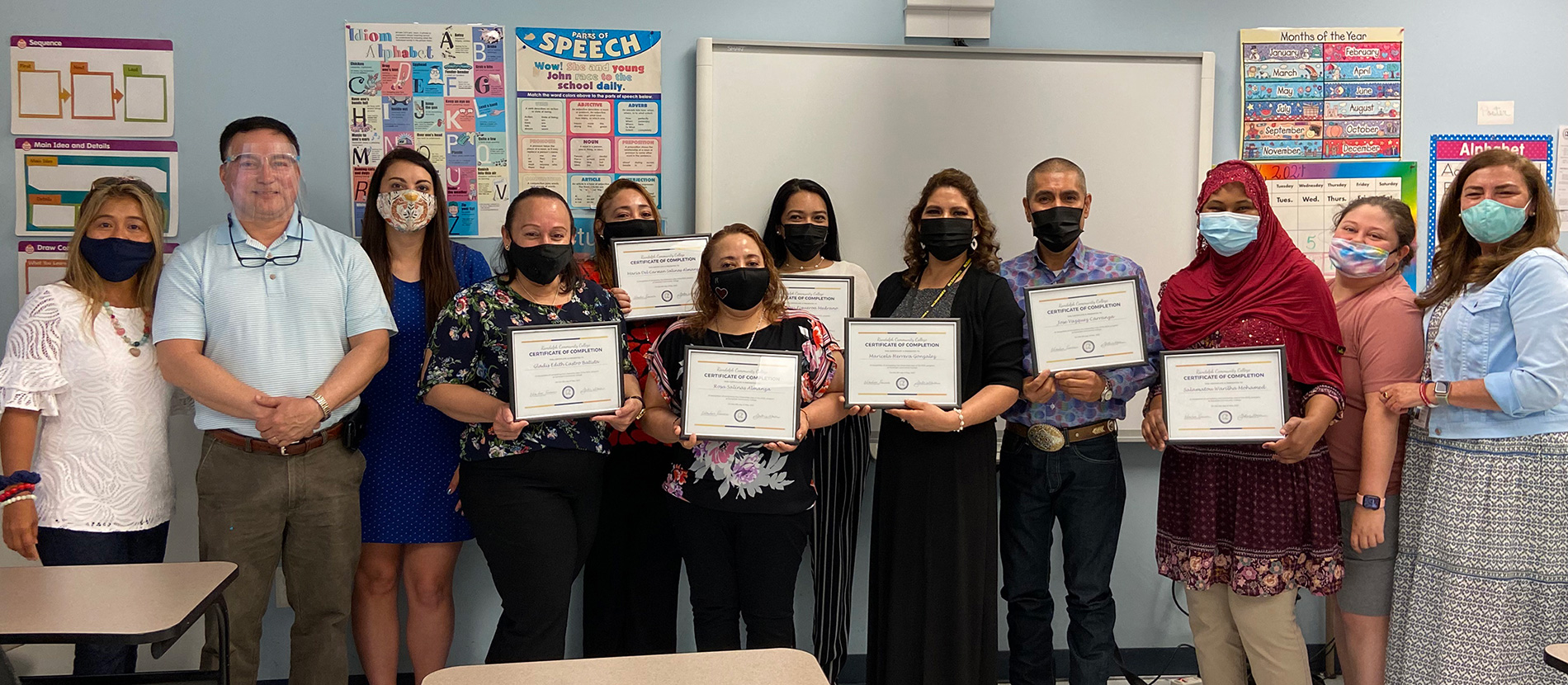 Randolph Community College’s College and Career Readiness Student In-Take Specialist Dahlia Oldham, Coordinator/Instructor of English for Speakers of Other Languages (ESOL) Abraham Encinas, Director of College and Career Readiness Jordan Williamson, Gladis Castro Batista, Maria Del Carmen Salinas Almanza, Rosa Salinas Almanza, Diana Figueroa Medrano, Marcela Herrera Gonzalez, Jose Vasquez Carranza, Salamatou Mohamed, Lead Instructor for College and Career Readiness Emma Lambirth, and Citizenship Instructor Lizbel Loechle-Yuzzelli celebrate after students received their Certificates of Completion on Saturday, May 8, at the Chevy Centre in Asheboro. Not pictured is Helena Lambeth.