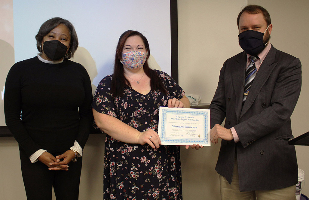 Randolph Community College student Shannon Calderon (center) was presented with the fourth annual Waymon C. Martin Phi Theta Kappa Scholarship in a ceremony Friday, Dec. 10, in room 018 of the Administration/Education Center on the Asheboro Campus. At left is Martin's daughter, Toi Gray, and at right is English/Communication Instructor and Phi Theta Kappa Adviser Clark Adams.