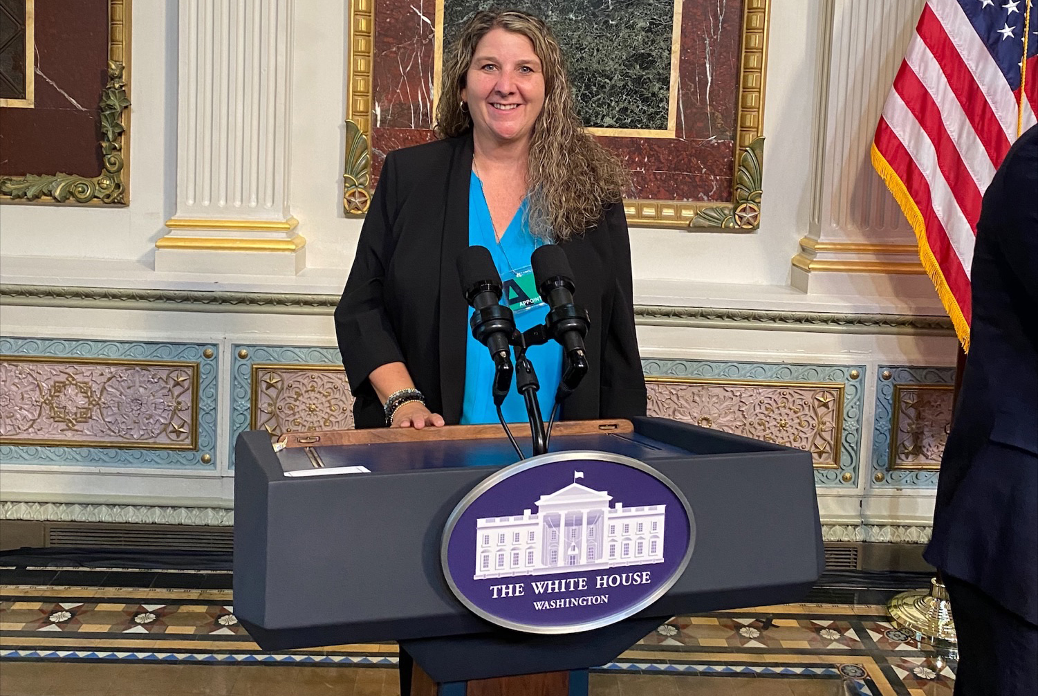 Randolph Community College Director of Apprenticeships and Pathways Stacey Miller stops at the podium before taking her seat. Members of the first cohort of Apprenticeship Ambassadors gathered at the White House on Thursday, Sept. 1, for the launching of the Apprenticeship Ambassador Initiative. 