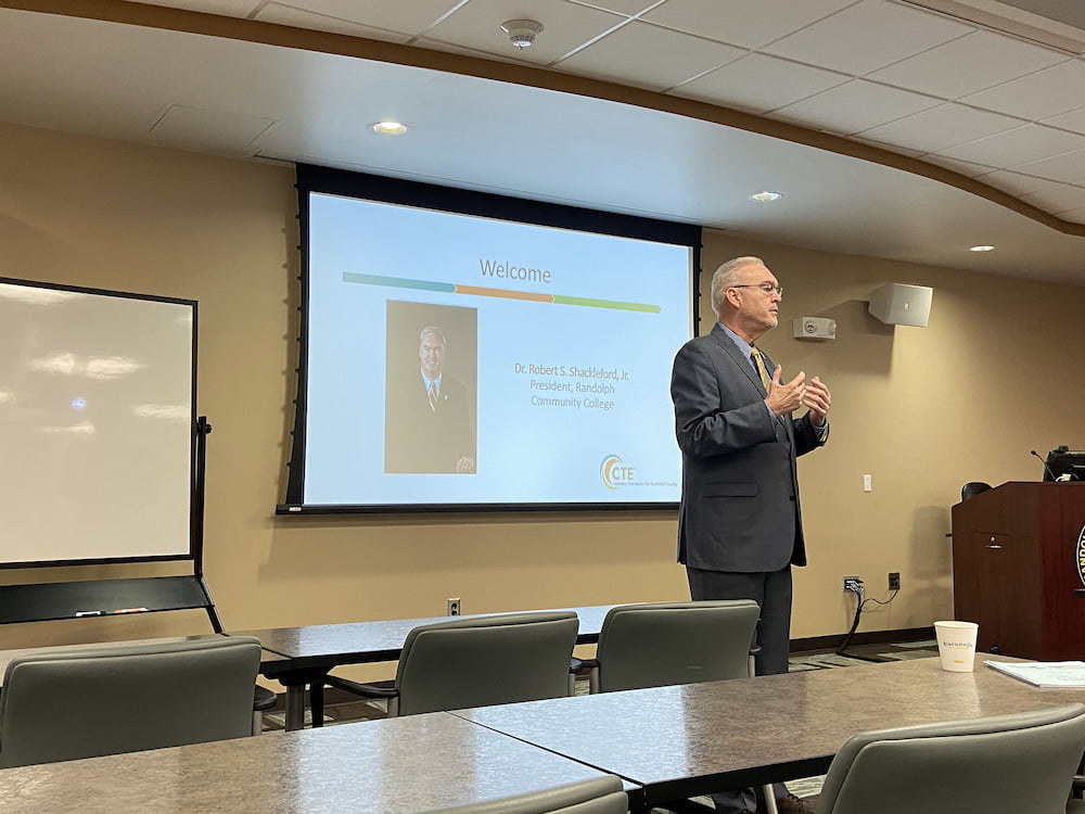 Randolph Community College President Dr. Robert S. Shackleford Jr. opens the State of the County on Tuesday, March 29, in the JB & Claire Davis Corporate Training Center on the Asheboro Campus.