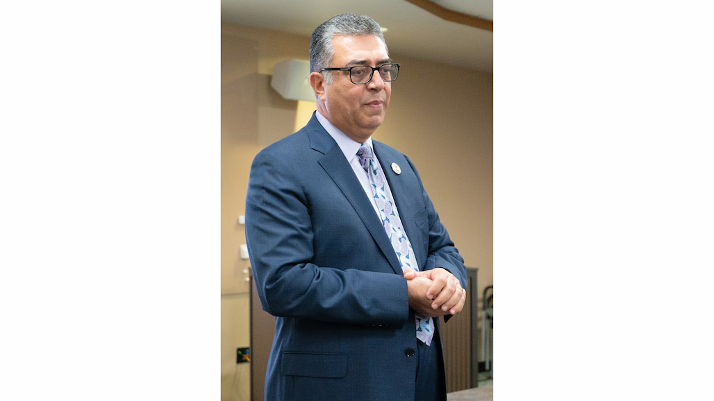 Photo of a man speaking.