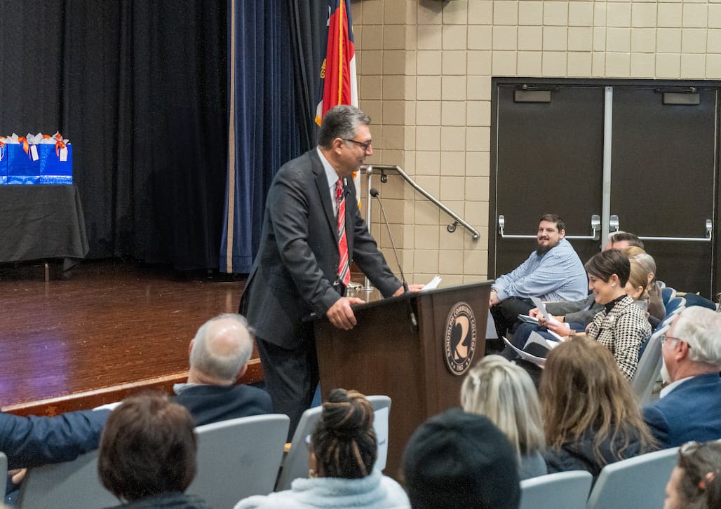 Photo of a person giving a speech.