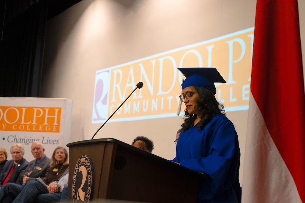 Photo of a person giving a speech.