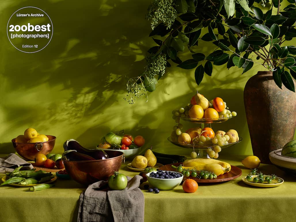 Photo of a table with fruit and plants on it.