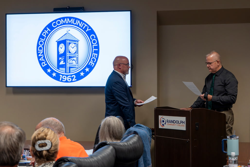 Photo of a person swearing in another person.