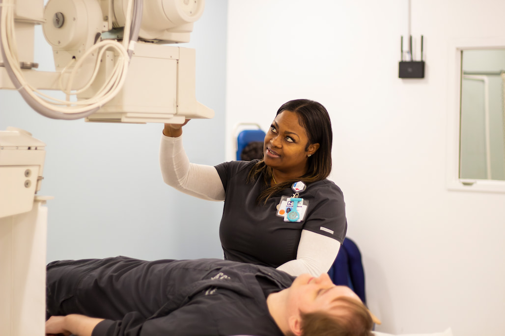 Photo of Radiography students simulating abdominal imaging at Randolph Community College's Allied Health Center.