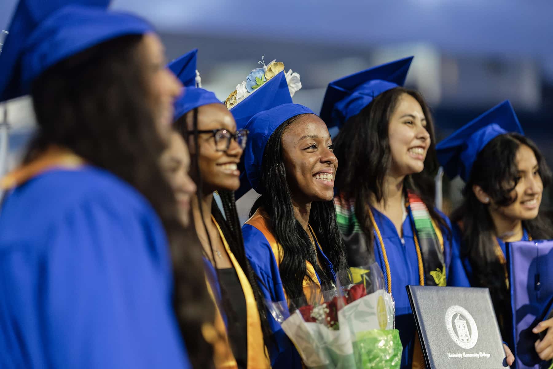 Photo of graduates having their picture taken.